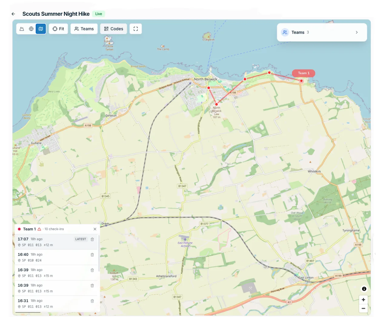 Scoutworks live location tracking: a live map of a Scouts summer night hike near North Berwick showing a team’s route and a panel of their timed check-ins with grid references.